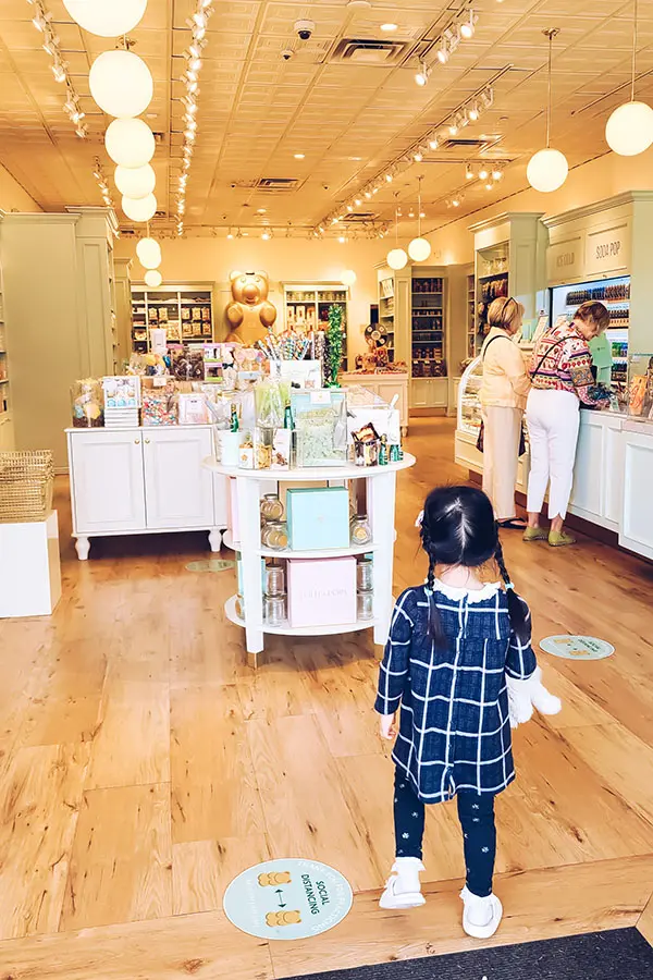 Child walking into the candy shop, downtown Palm Springs